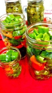 Peppers prepared and awaiting brine photo