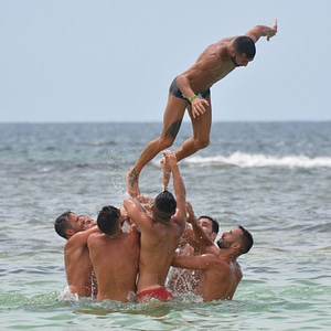 Swimming trunks somersault submerge photo