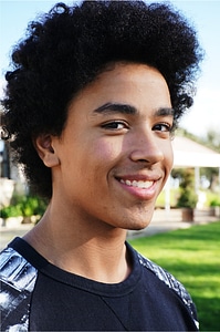 Smile afro haircut male photo