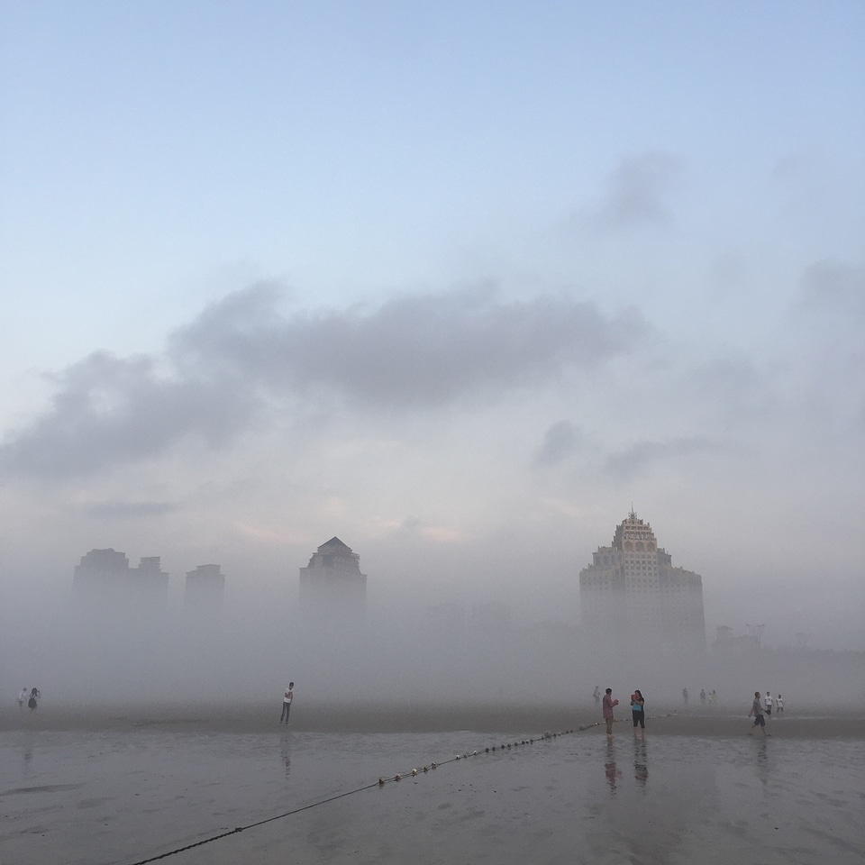 Fog early in the morning tall buildings