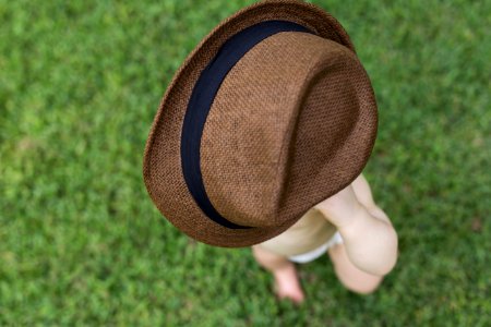 Baby tipping hat