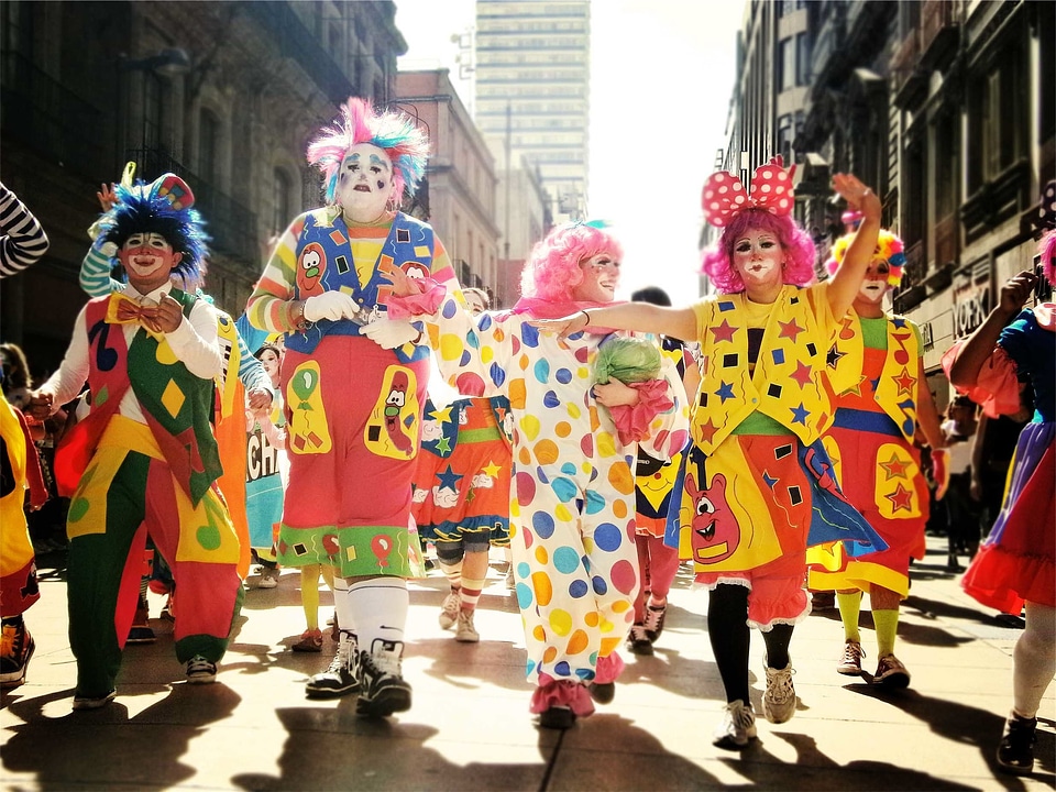 Clowns parade people