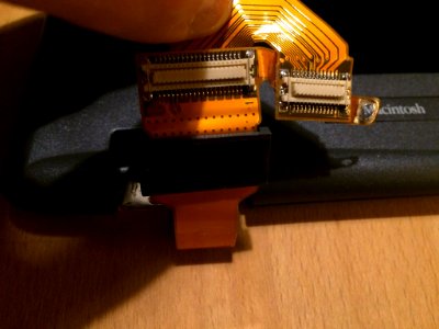 Powerbook 2400 take apart. It has a green light when I power it on. After putting it back together the issue persists.