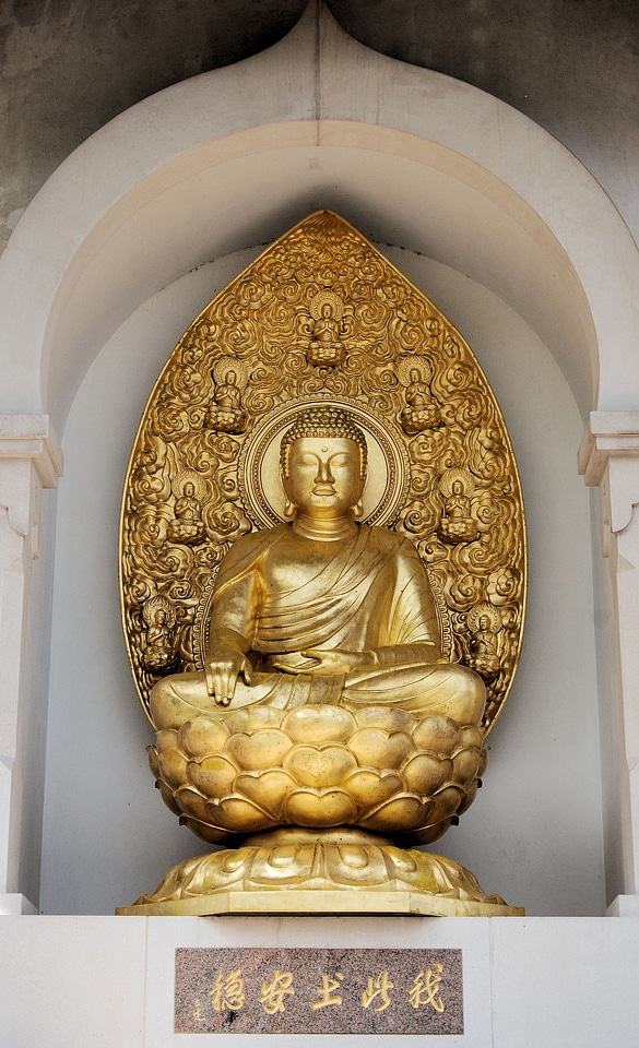 Sculpture golden brown peace