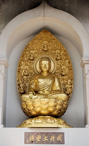 Sculpture golden brown peace