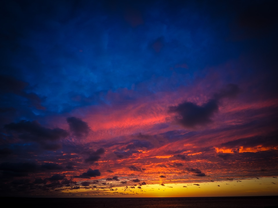 Setting sun afterglow clouds