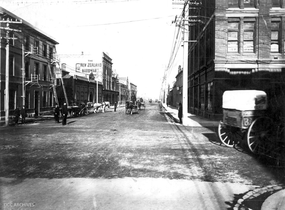 Corner of Stuart and Cumberland Street showing Law Courts Hotel and NZ Hardware Company