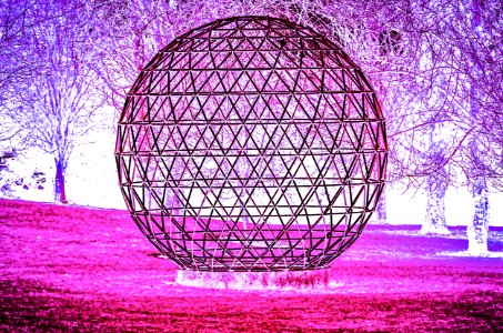 A geodesic dome is a hemispherical thin-shell structure (lattice-shell) based on a geodesic polyhedron. The triangular elements of the dome are structurally rigid and distribute the structural stress throughout the structure, making geodesic domes able to photo