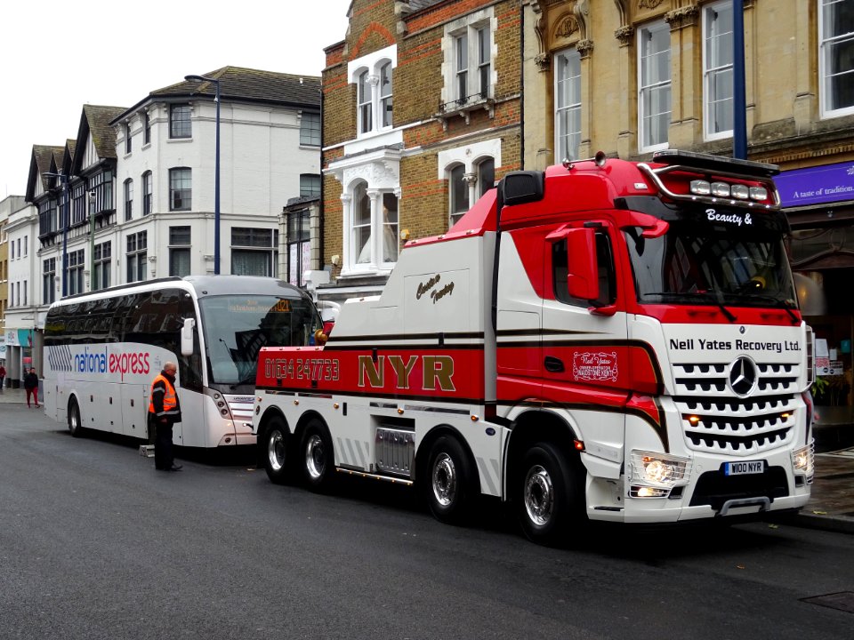 Ten photos of National Express Coach that hit granite pillars in High Street Maidstone. It was only a matter of time. photo