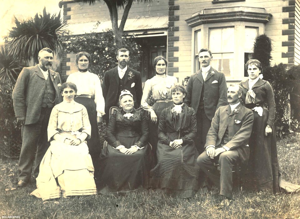 Family group outside house, Mosgiel or Taieri c1906