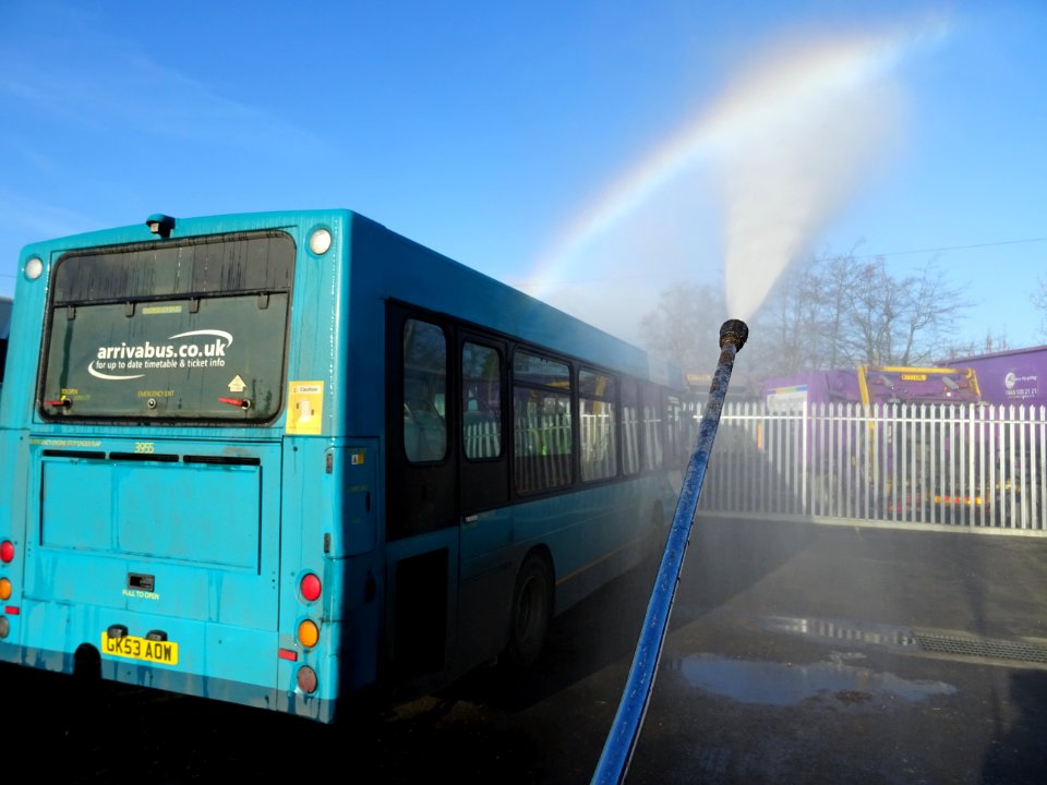 MAKING RAINBOWS with the jet wash gun.