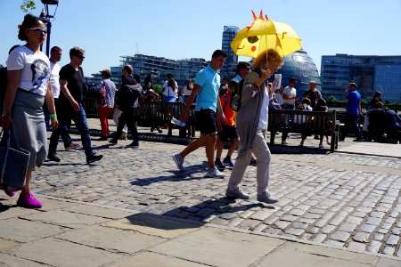 Follow Me. A tour guide working at The Tower of London