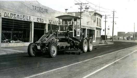 Grader along Princes Street, 1938 photo