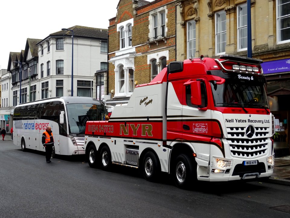 Ten photos of National Express Coach that hit granite pillars in High Street Maidstone. It was only a matter of time. photo