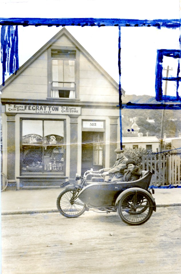 Indian Powerplus Motorcycle outside the Kewpie Cash Store at 522 King Street, 1923. Additions to photograph show proposed alterations to building