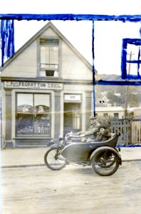 Indian Powerplus Motorcycle outside the Kewpie Cash Store at 522 King Street, 1923. Additions to photograph show proposed alterations to building