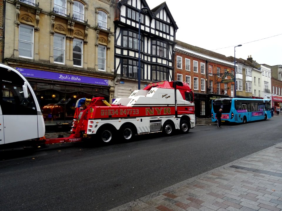 Ten photos of National Express Coach that hit granite pillars in High Street Maidstone. It was only a matter of time.