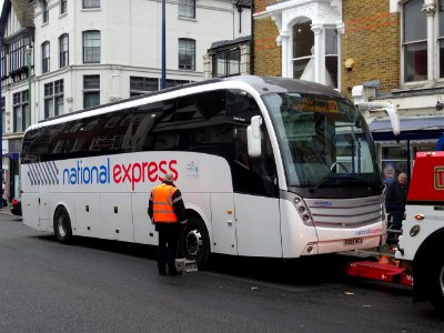 Ten photos of National Express Coach that hit granite pillars in High Street Maidstone. It was only a matter of time. photo