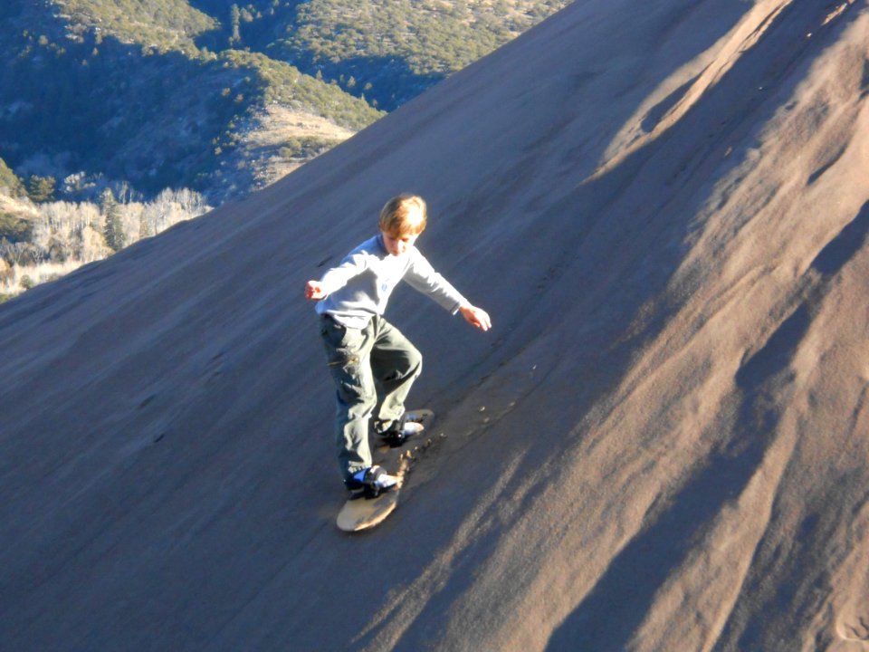 Boy Sandboarding