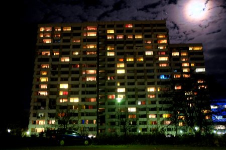 lone car under full moon