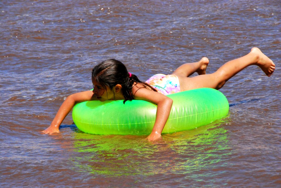 Girl Floating Medano Creek
