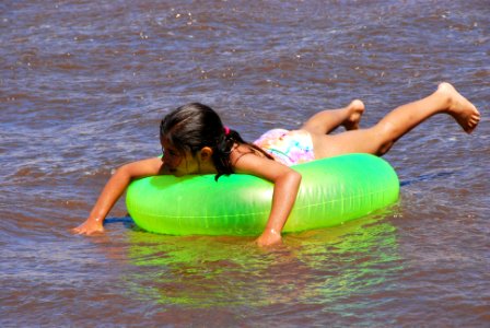 Girl Floating Medano Creek