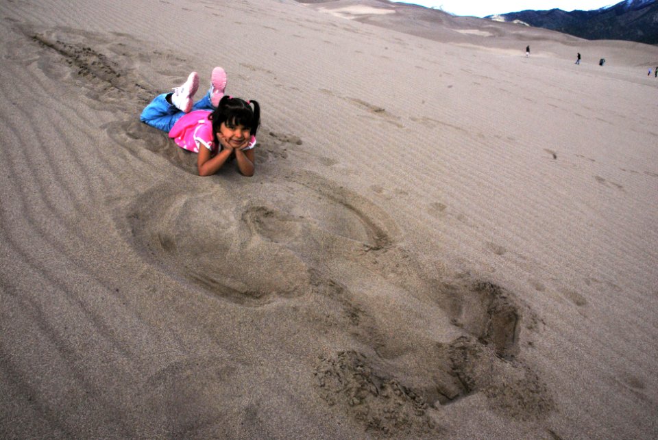 Girl With Her Finished Sand Angel