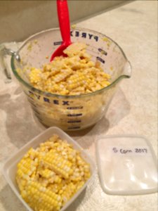 Corn being packaged for freezing 1 photo
