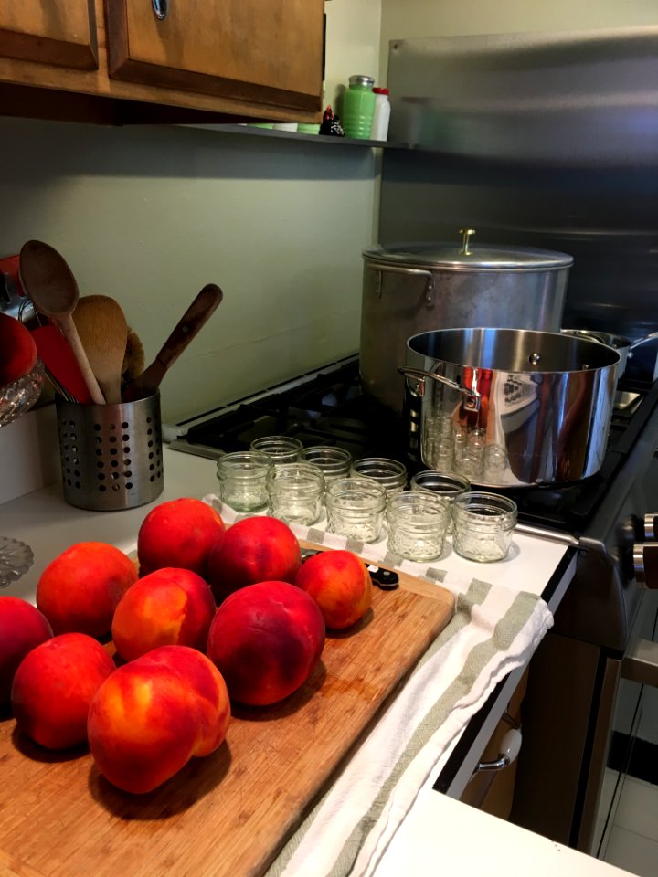Peaches with jam jars and boiling water bath canner