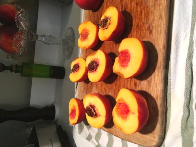Halved fresh peaches