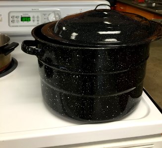 Boiling water canner on stove photo