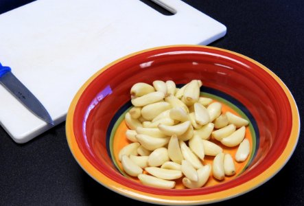 Garlic cloves for pickled asparagus photo