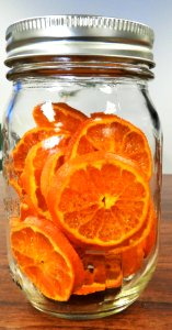 Dried oranges in mason jar photo