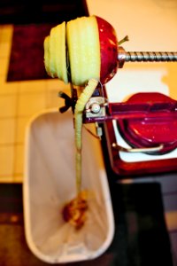 Apple peel over waste container