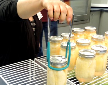 Lifting jars out of canner photo