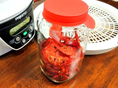 Conditioning dried tomatoes photo