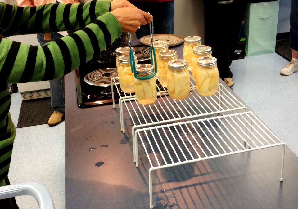 Moving caned pears to rack