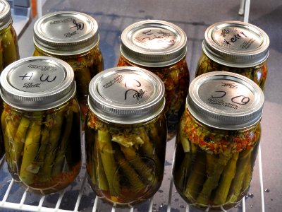 Processed jars of pickled asparagus photo