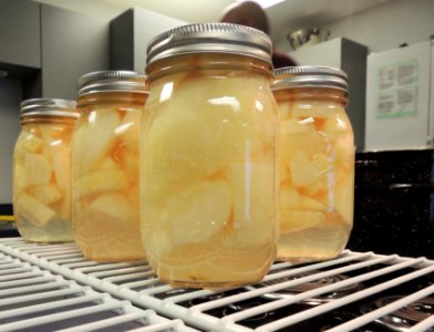 Canned pears in mason jars photo