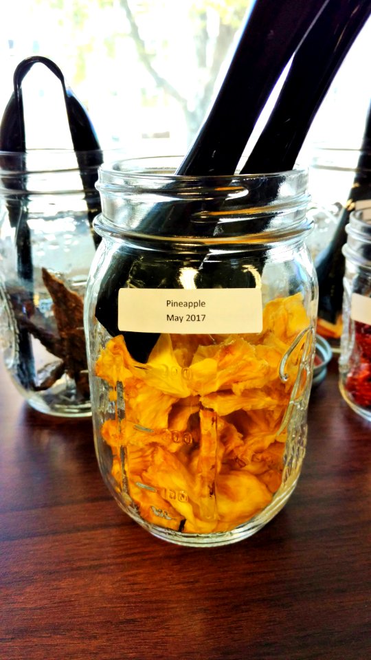 Sampling dried pineapple