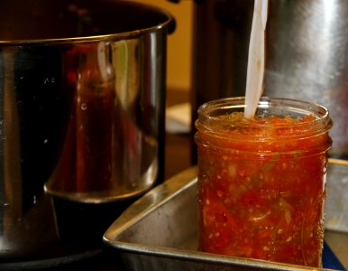 Removing air bubbles from salsa photo