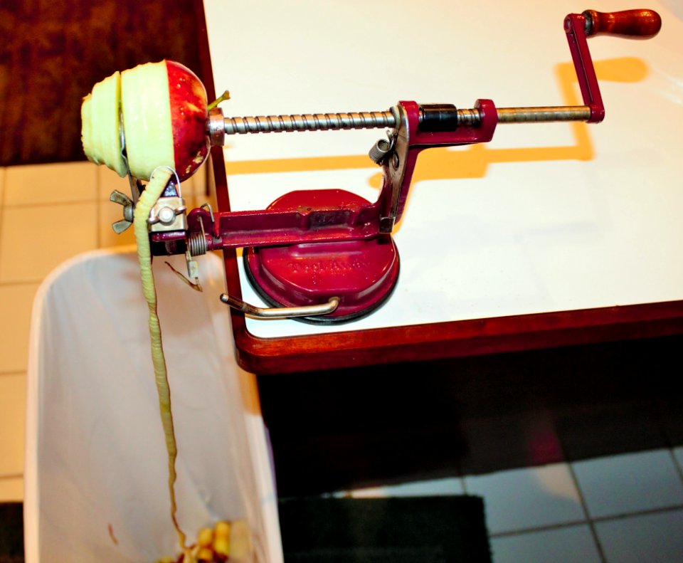 Apple peeler removing skin