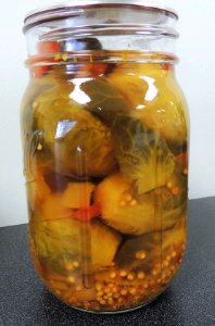 Pickled Brussels sprouts in mason jar photo