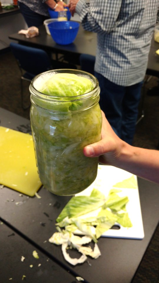 Filled mason jar ready for fermentation photo