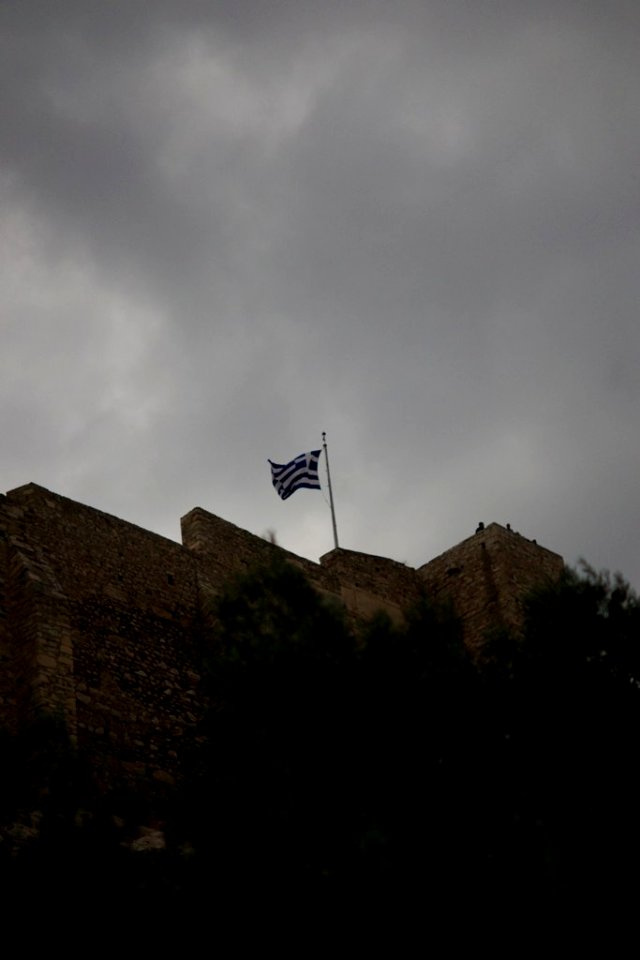 Clouds over Greek flag