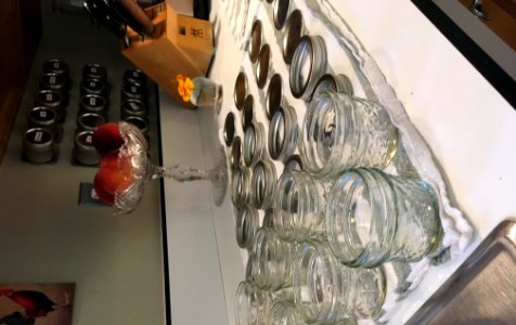 Washed small jam jars with lids and rings photo