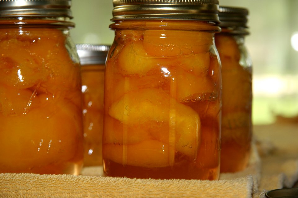 Jars of canned peaches