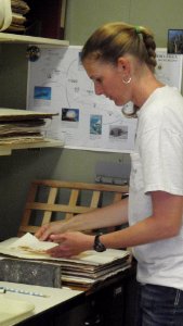 Examining Limu Specimen in Lab photo