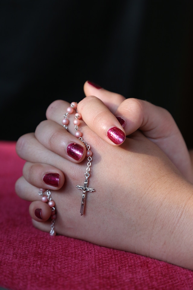 Rosary pray woman