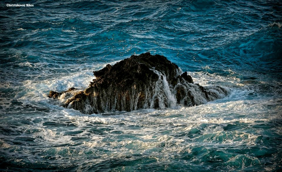 Waves on a rock in Potami Beach